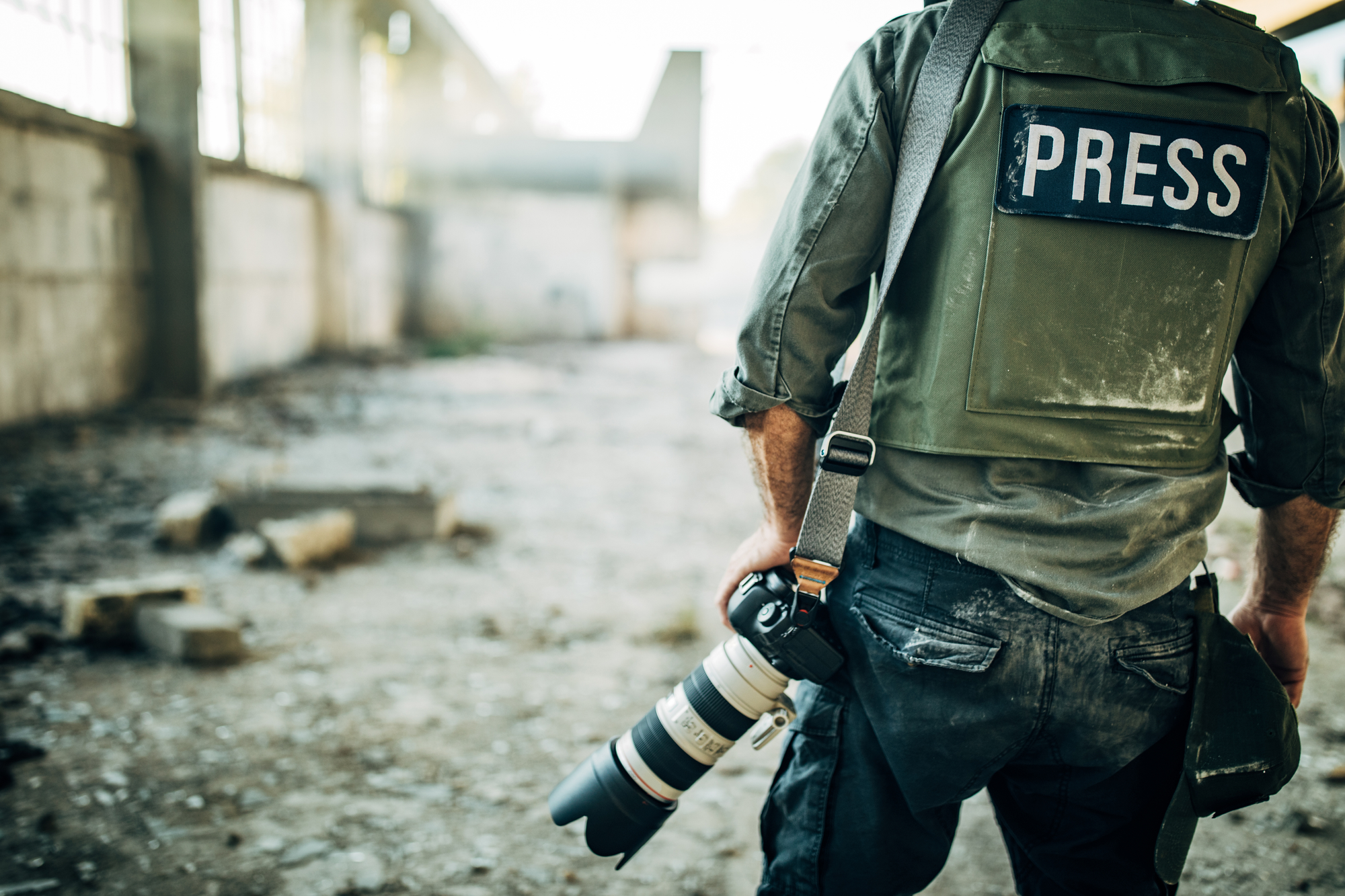 Man war journalist with camera