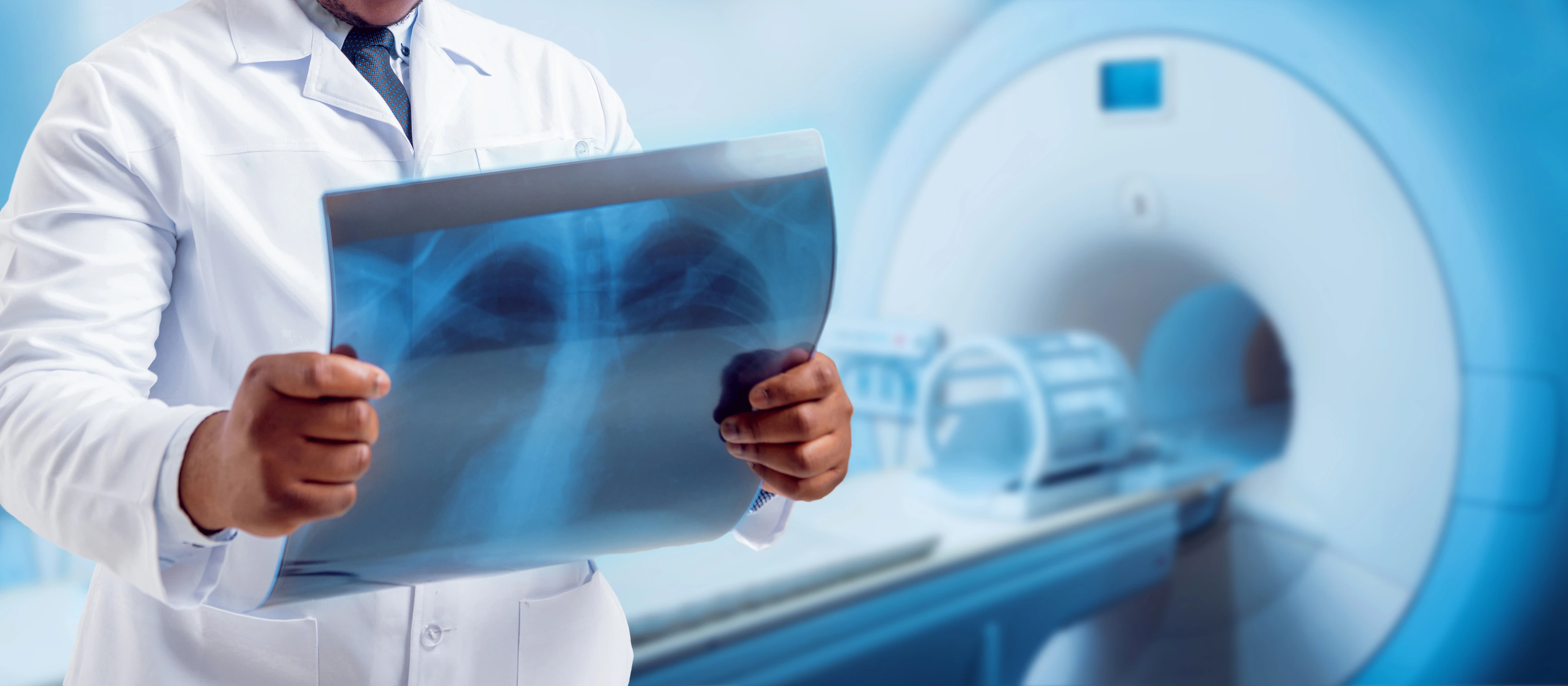 Doctor looking MRI picture. Medical equipment.