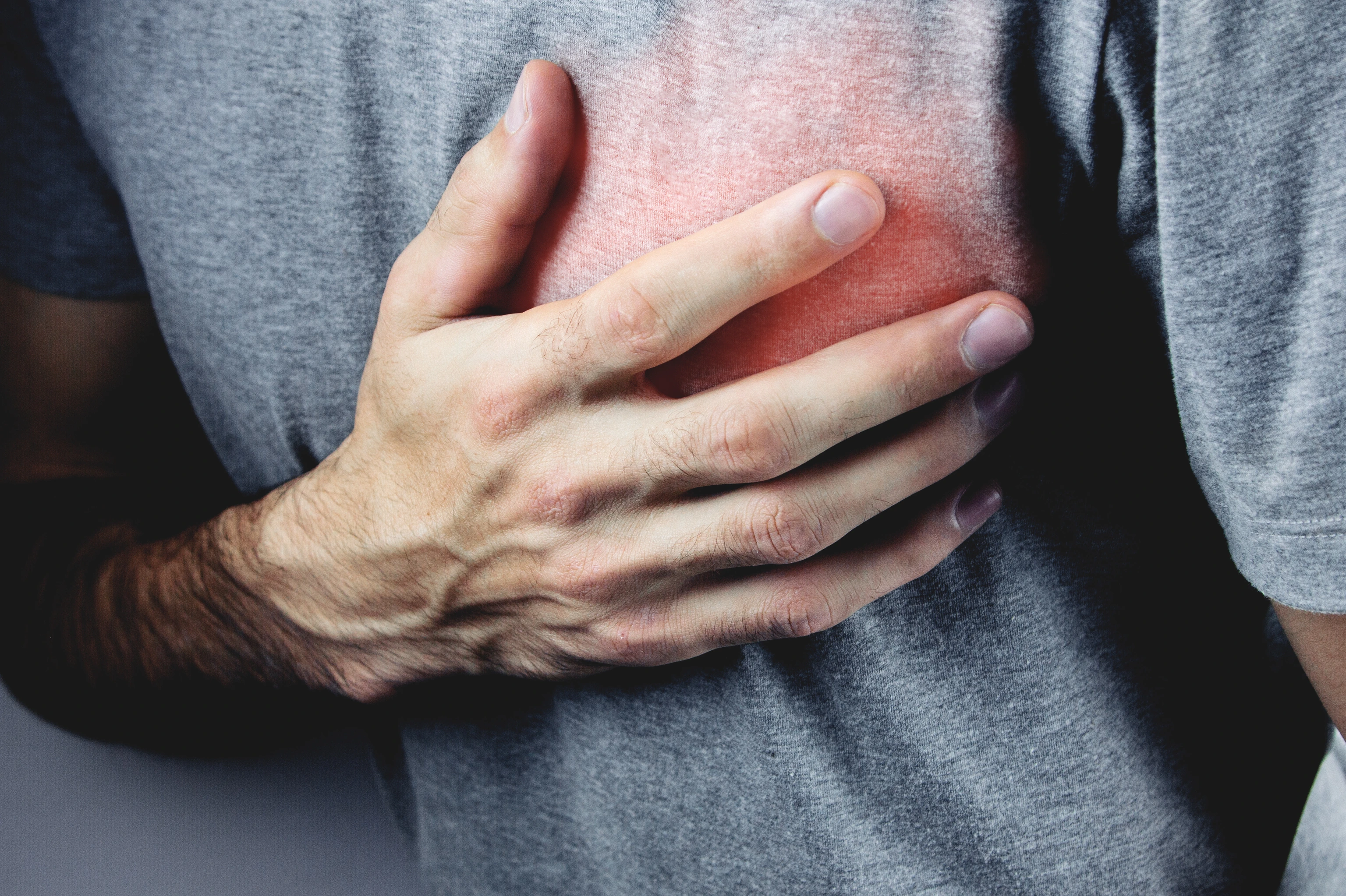 a young man has heart pains