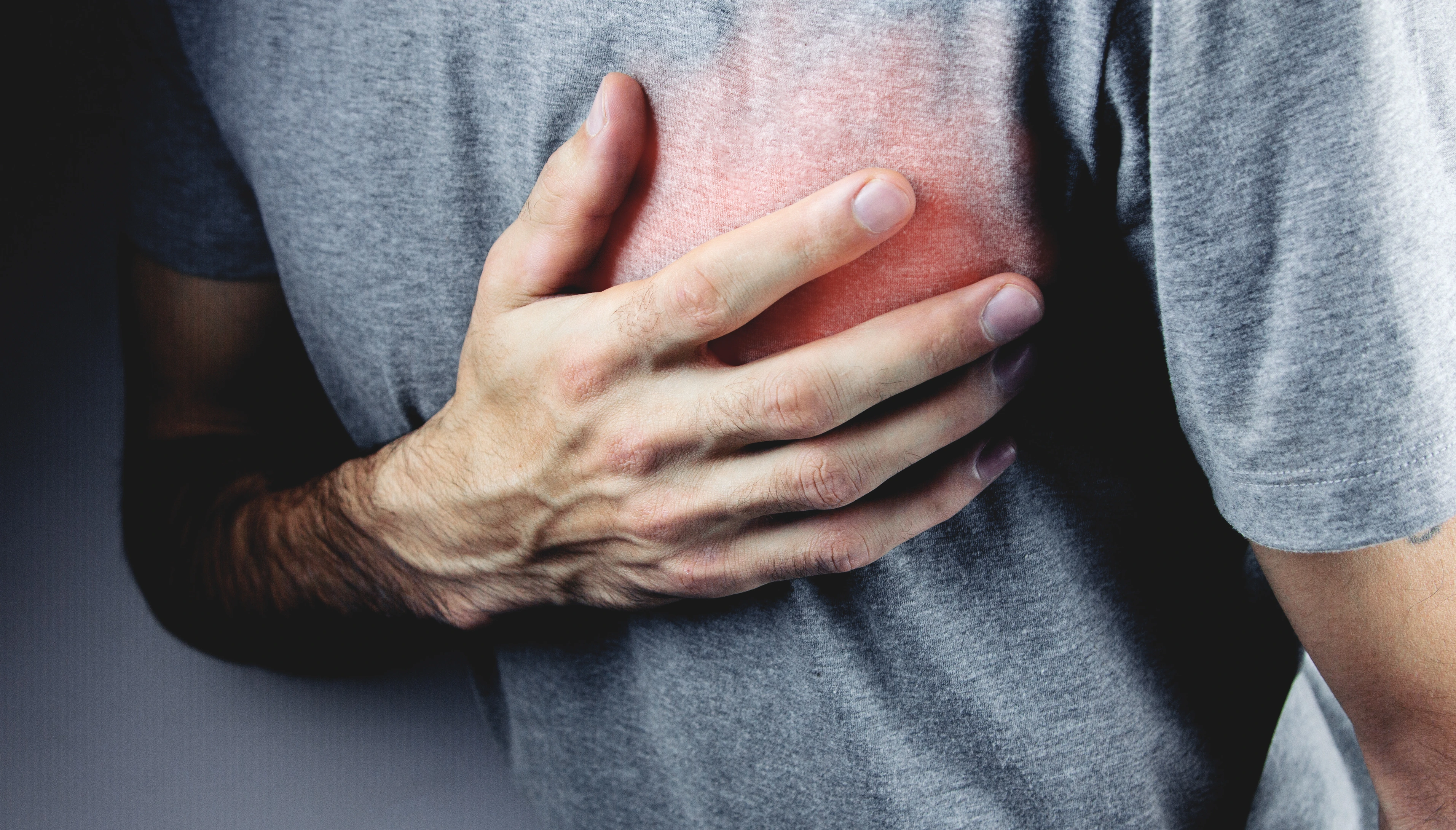 a young man has heart pains