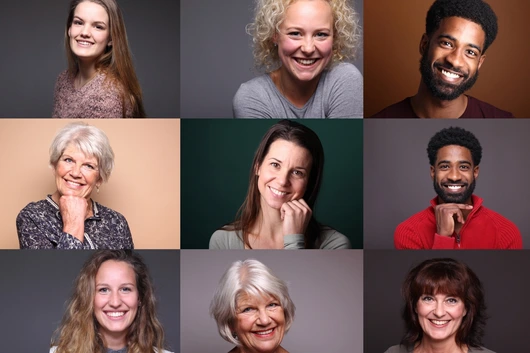 Group of 11 different people in front of a colored background