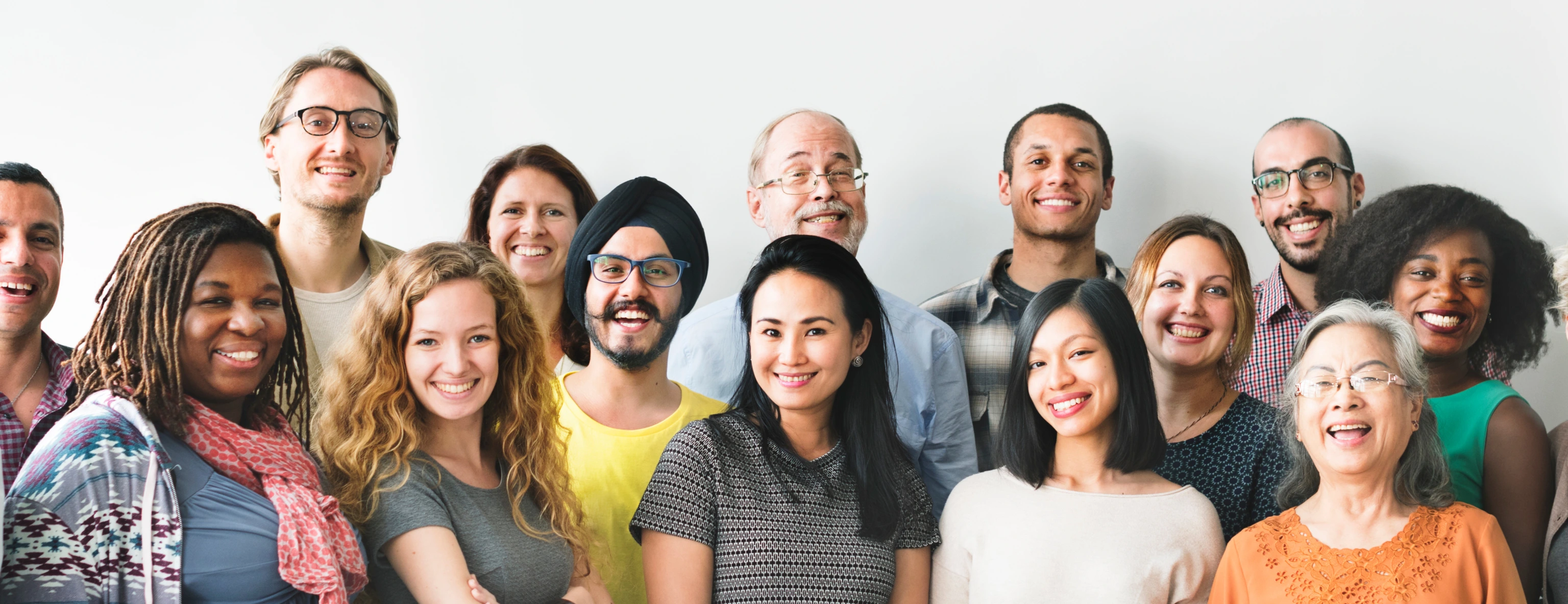 A team of diverse people doing a group photo