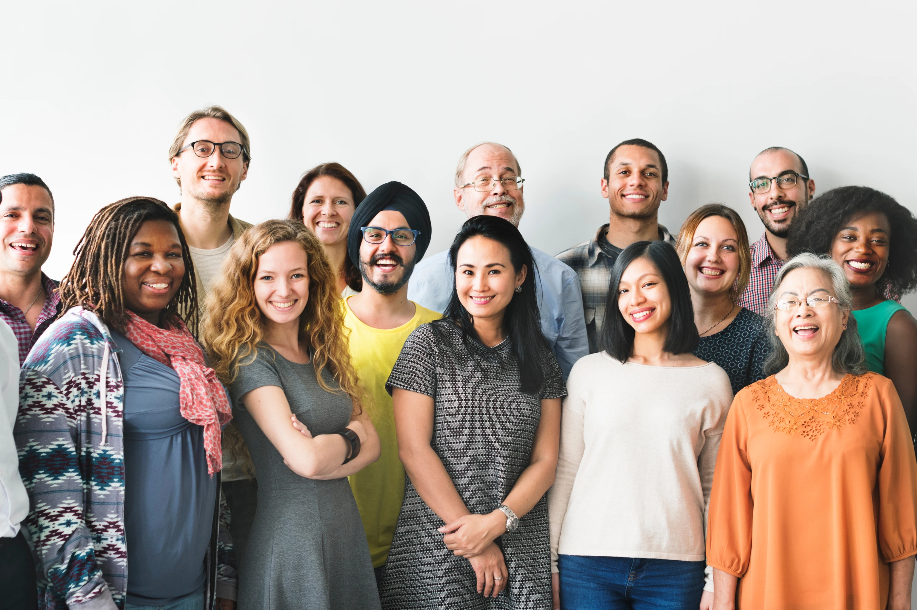 A team of diverse people doing a group photo