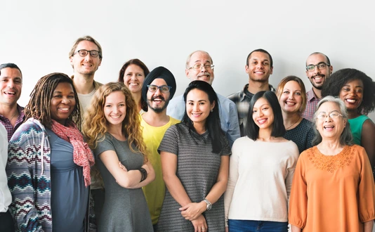 A team of diverse people doing a group photo