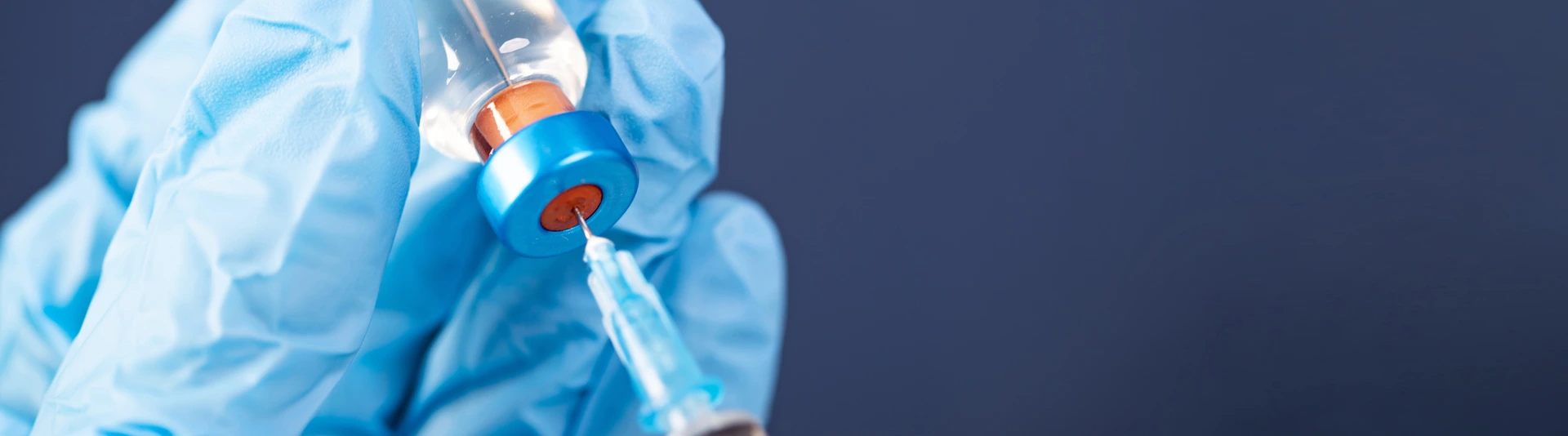 Covid-19 vaccination with vaccine bottle and syringe injection tool for coronavirus immunization treatment.