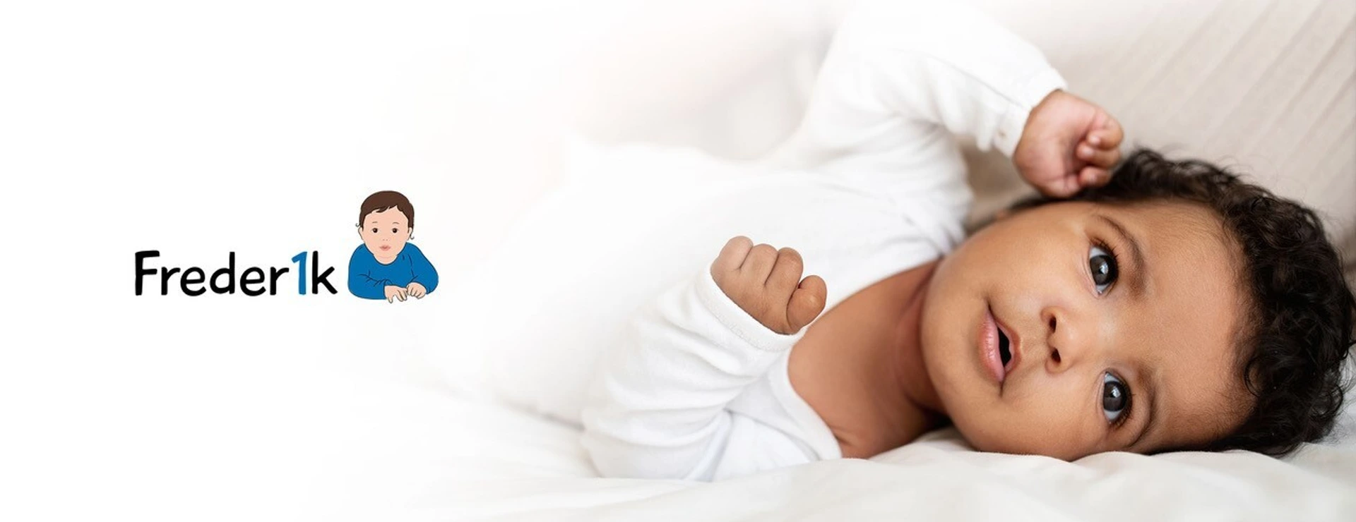 sweet-cute-little-african-american-baby-lies-on-so-2023-11-27-04-56-17-utc_mit Freder1k Logo