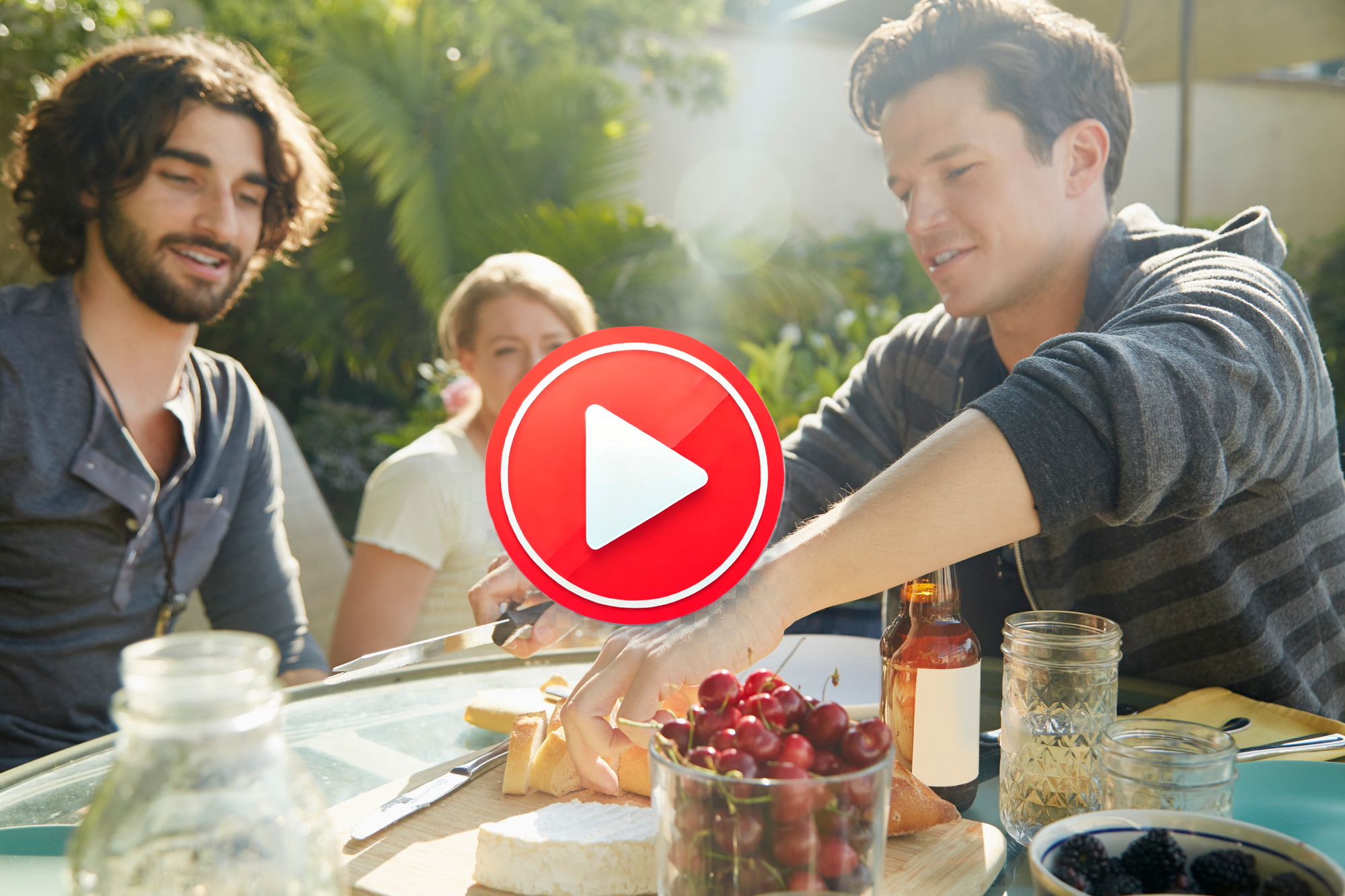 Friends enjoying meal at outdoor party