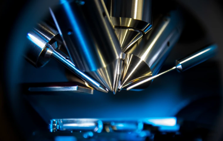 Time of flight mass spectrometer in closeup shot with blue light