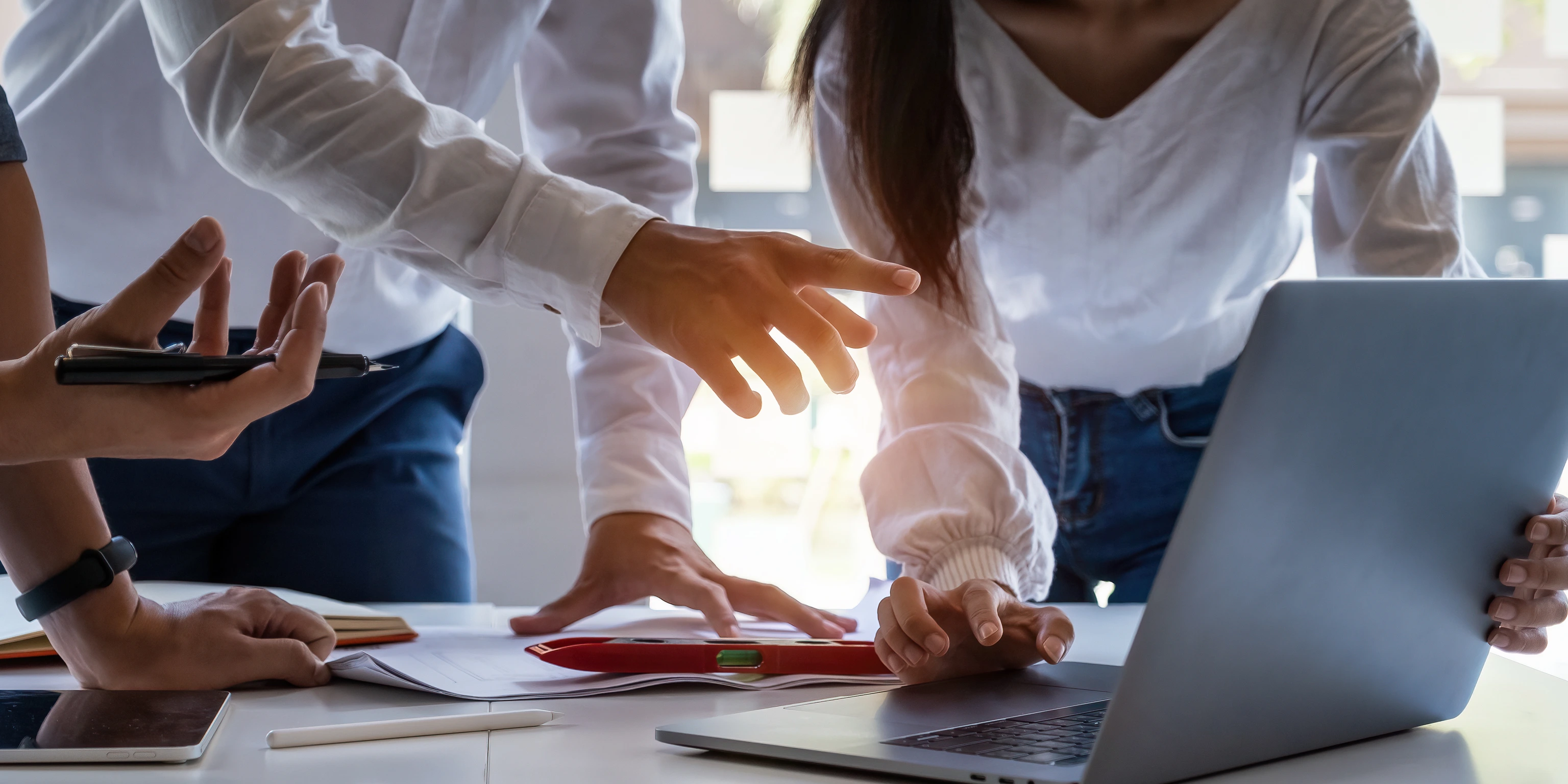 Analytics intelligence concept. Group of business people discuss current financial and economic on laptop for investment at the meeting.